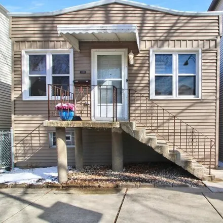 Buy this 4 bed house on 3325 South Lituanica Avenue in Chicago, IL 60608