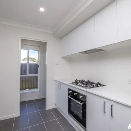 Rent this 4 bed apartment on 11 Riviera Street in Forster NSW 2428, Australia