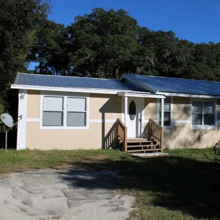 Buy this 4 bed house on 2744 Northeast 200th Avenue in Levy County, FL 32696