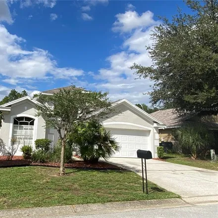 Rent this 3 bed house on 507 Canna Drive in Polk County, FL 33897