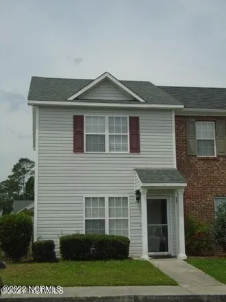 Rent this 2 bed townhouse on 899 Ashbrook Lane in Jacksonville, NC 28546