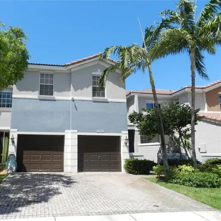 Rent this 3 bed townhouse on 11495 Northwest 80th Lane in Medley, Miami-Dade County