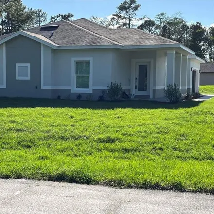 Buy this 4 bed house on 1908 Villa Drive in Deltona, FL 32738