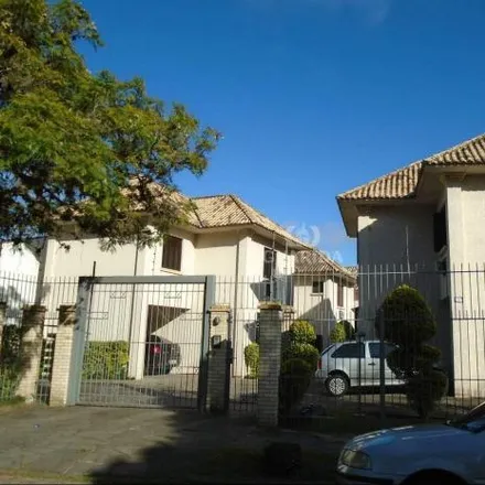 Rent this 3 bed house on Rua Jacundá in Guarujá, Porto Alegre - RS