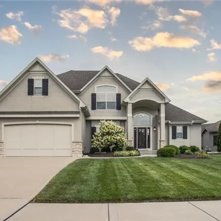 Buy this 5 bed house on 1708 NE Woodland Shores Ct in Missouri, 64086