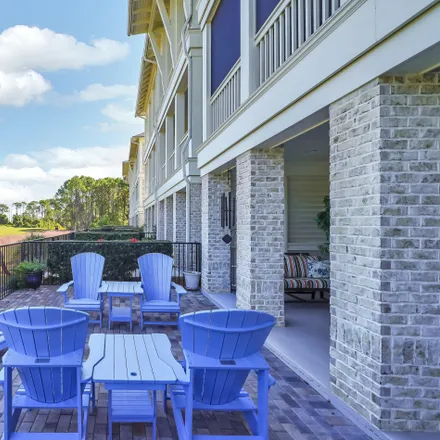 Buy this 4 bed townhouse on Bahia Drive in Navarre, FL 32566