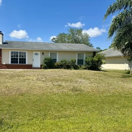 Rent this 3 bed house on 277 Barbarossa Road Northwest in Palm Bay, FL 32907