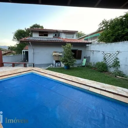 Rent this 4 bed house on Avenida São Carlos in Jardim do Lago, Atibaia - SP