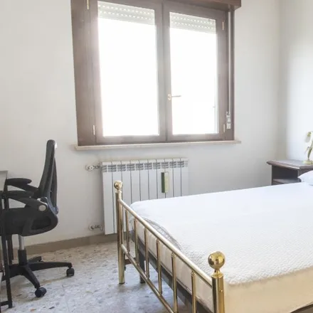 Rent this 2 bed room on Viale Erminio Spalla in 00142 Rome RM, Italy