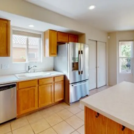 Buy this 4 bed apartment on 7151 Deer Canyon Avenue Northeast in Northeast Albuquerque, Albuquerque