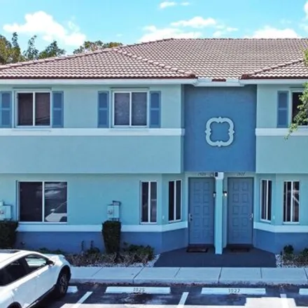 Buy this 2 bed townhouse on 1931 Hibiscus Lane in Riviera Beach, FL 33404