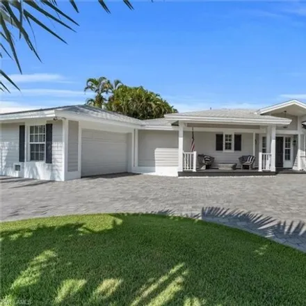 Rent this 3 bed house on 1665 Murex Lane in Naples, FL 34102