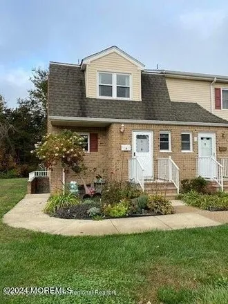 Rent this 2 bed townhouse on 67 Windsor Terrace in Stonehurst East, Freehold Township