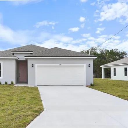 Buy this 4 bed house on 1045 Douglas Street Southeast in Palm Bay, FL 32909