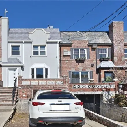 Buy this 3 bed house on 82-15 Penelope Avenue in New York, NY 11379
