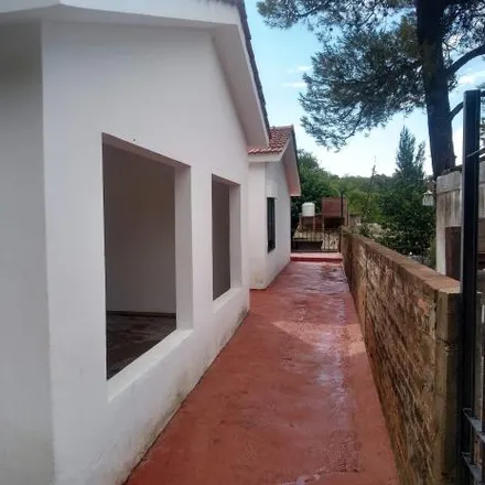 Buy this 4 bed house on Alfonsina Storni in Departamento Punilla, Villa Carlos Paz