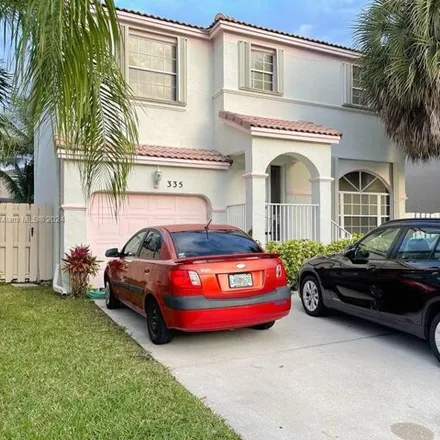 Rent this 3 bed house on 415 Northwest 152nd Lane in Pembroke Pines, FL 33028