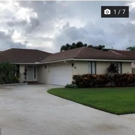 Rent this 4 bed house on 17203 Lake Park Road in Palm Beach County, FL 33487