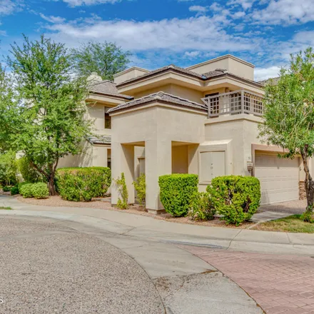 Buy this 2 bed townhouse on 7272 East Gainey Ranch Road in Scottsdale, AZ 85258