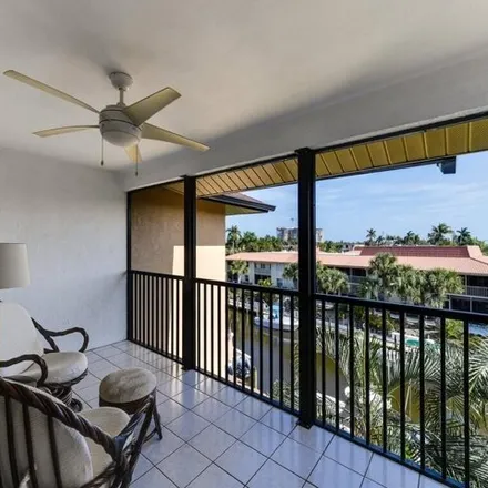 Buy this 2 bed condo on Clam Court in Naples, FL