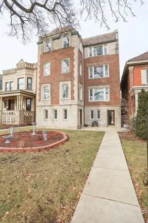 Rent this 4 bed house on 2712 West Logan Boulevard in Chicago, IL 60647