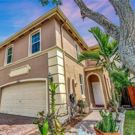 Buy this 3 bed townhouse on 3500 Asperwood Circle in Coconut Creek, FL 33073