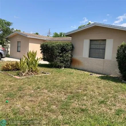 Buy this 3 bed house on 4459 Northwest 23rd Street in Lauderhill, FL 33313