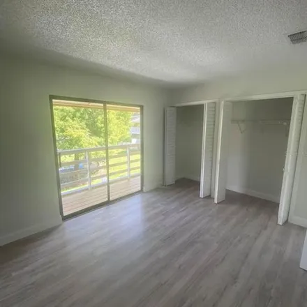 Rent this 2 bed apartment on 22648 Gage Loop in Land O' Lakes, FL 34639