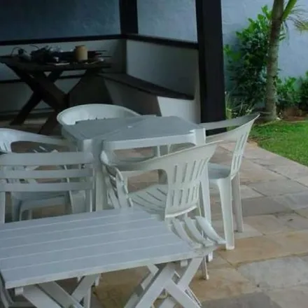 Buy this 4 bed house on Estrada Jornalista Jaime de Arruda Ramos in Ponta das Canas, Florianópolis - SC