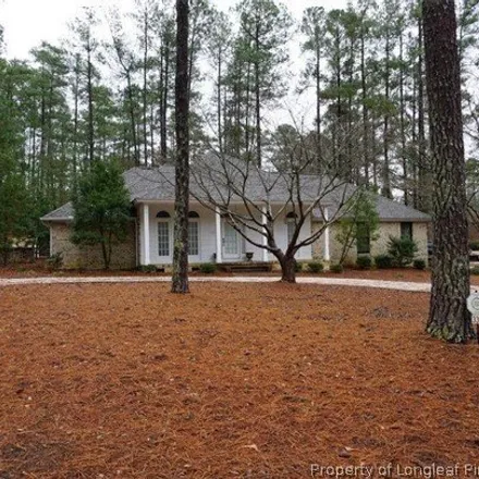 Rent this 4 bed house on 374 West Hedgelawn Way in Huntcliff, Southern Pines