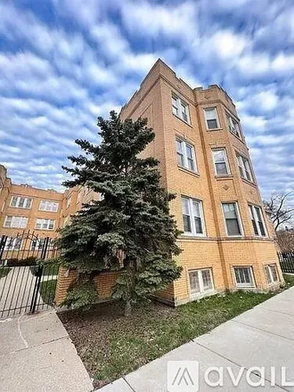 Rent this 2 bed apartment on 2952 N Laramie Ave