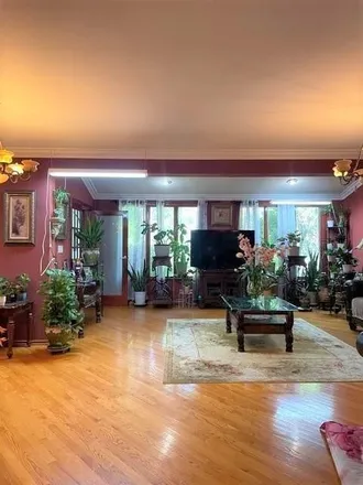 Buy this 7 bed townhouse on 2633 East 27th Street in New York, NY 11235