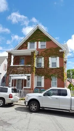 Rent this 4 bed apartment on 1;3 Dracut Street in Lowell, MA 01854