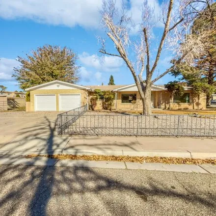 Buy this 3 bed house on 7237 Summer Avenue Northeast in Albuquerque, NM 87110