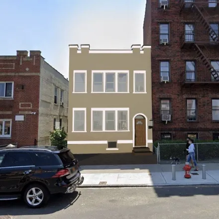 Buy this 5 bed townhouse on 25-05 41st Street in New York, NY 11103