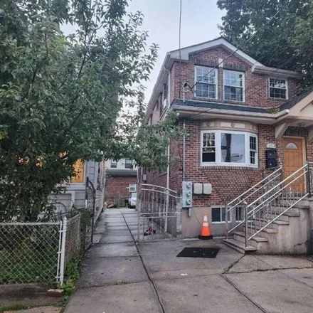 Buy this 5 bed house on 122-18 Lax Avenue in New York, NY 11356