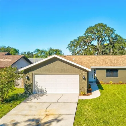 Buy this 3 bed house on 7829 Glascow Drive in Jasmine Estates, FL 34653
