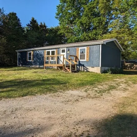 Buy this 3 bed house on 1009 Old Farm Road in Merriam Woods, Taney County