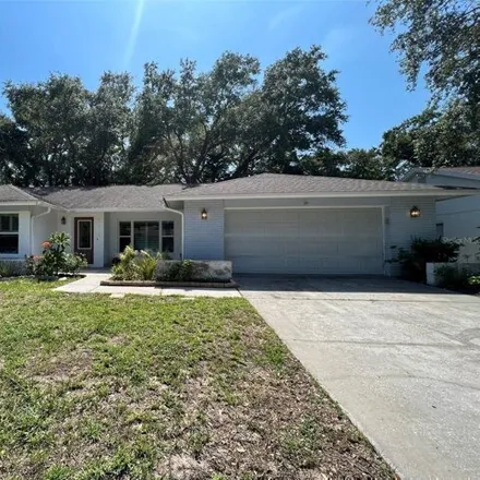 Rent this 3 bed house on 231 Arbor Dr E in Palm Harbor, Florida