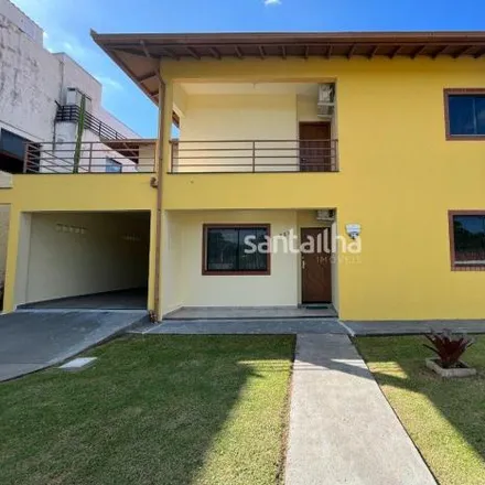 Rent this 4 bed house on Creche Poeta Cruz e Souza in Rua Jardim dos Eucaliptos, Campeche