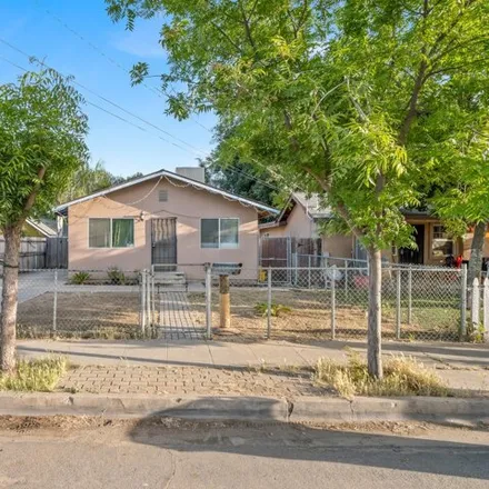 Buy this 3 bed house on 1026 Golden Way E in Dinuba, California
