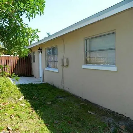 Buy this 3 bed house on 4541 Northeast 18th Avenue in Coral Hills, Fort Lauderdale