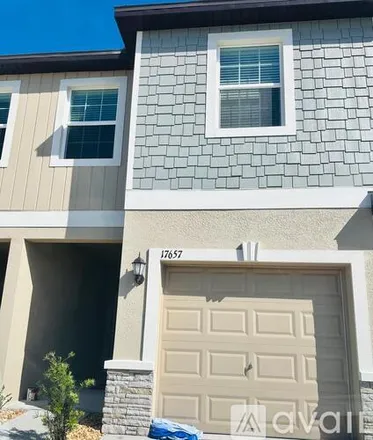 Rent this 3 bed townhouse on 17657 Nectar Flume Drive