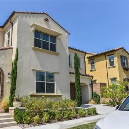 Rent this 4 bed house on 62 Walden in Irvine, California