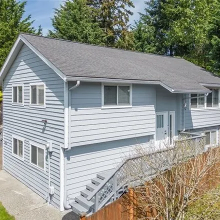 Buy this 4 bed house on 12026 Northeast 99th Lane in Kirkland, WA 98033