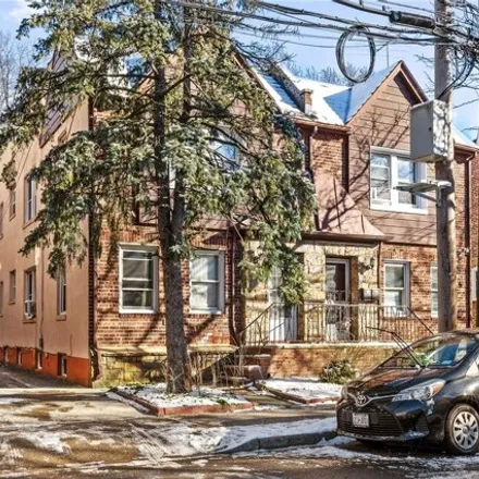 Buy this 4 bed townhouse on 68-11 Alderton Street in New York, NY 11374