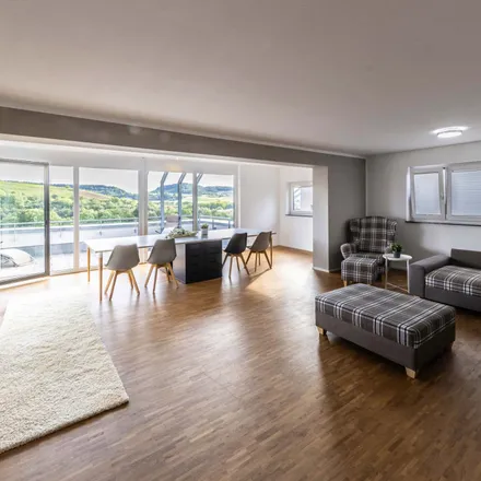 Rent this 2 bed apartment on Viertelsteige 46 in 74235 Binswangen, Germany