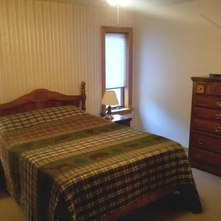 Rent this 4 bed house on Manistique