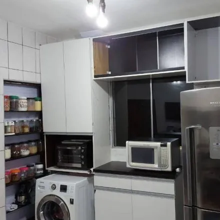 Buy this 2 bed apartment on Avenida Presidente Kennedy in Guilhermina, Praia Grande - SP