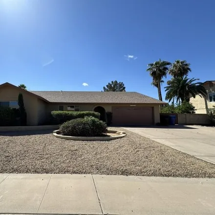 Rent this 4 bed house on 1351 West Lobo Avenue in Mesa, AZ 85202